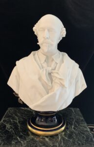 Le duc de Morny buste en biscuit de porcelaine sur piédouche émaillé bleu signé « Iselin 1865 » et portant sur le piédouche la marque «Gille jne fabt»